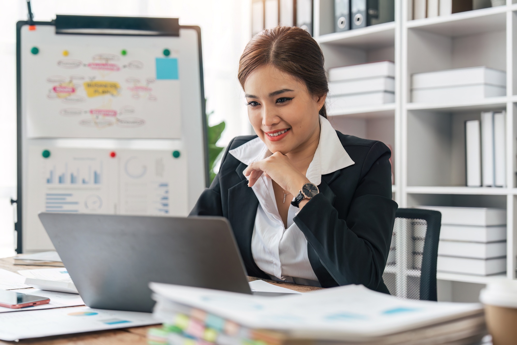 bookkeepers asia business woman working on tax consultant finance in a modern office. Make an